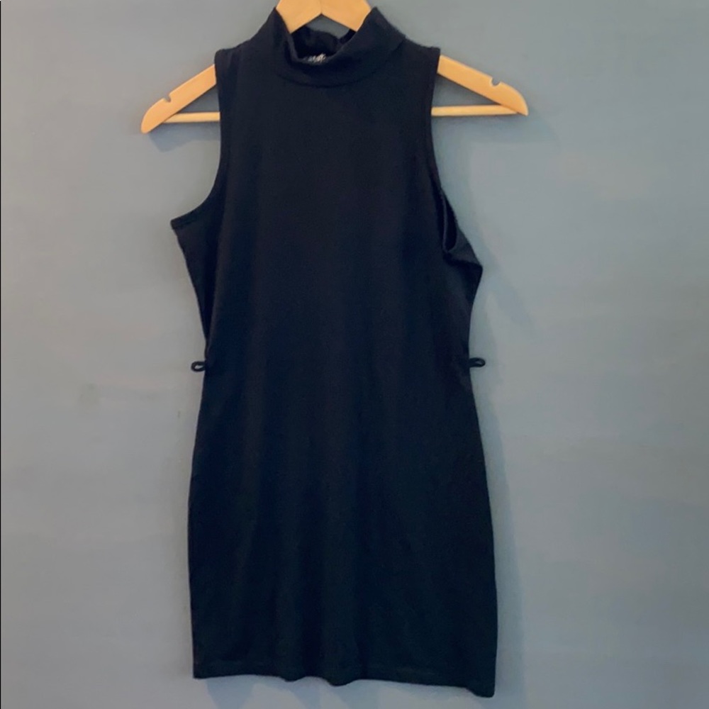 La classic couture black knee high dress size M